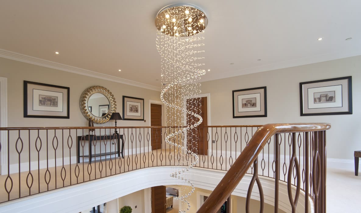 BESPOKE ORNATE BALUSTRADE WITH CARVED OAK HANDRAIL BESPOKE ORNATE BALUSTRADE WITH CARVED OAK HANDRAIL