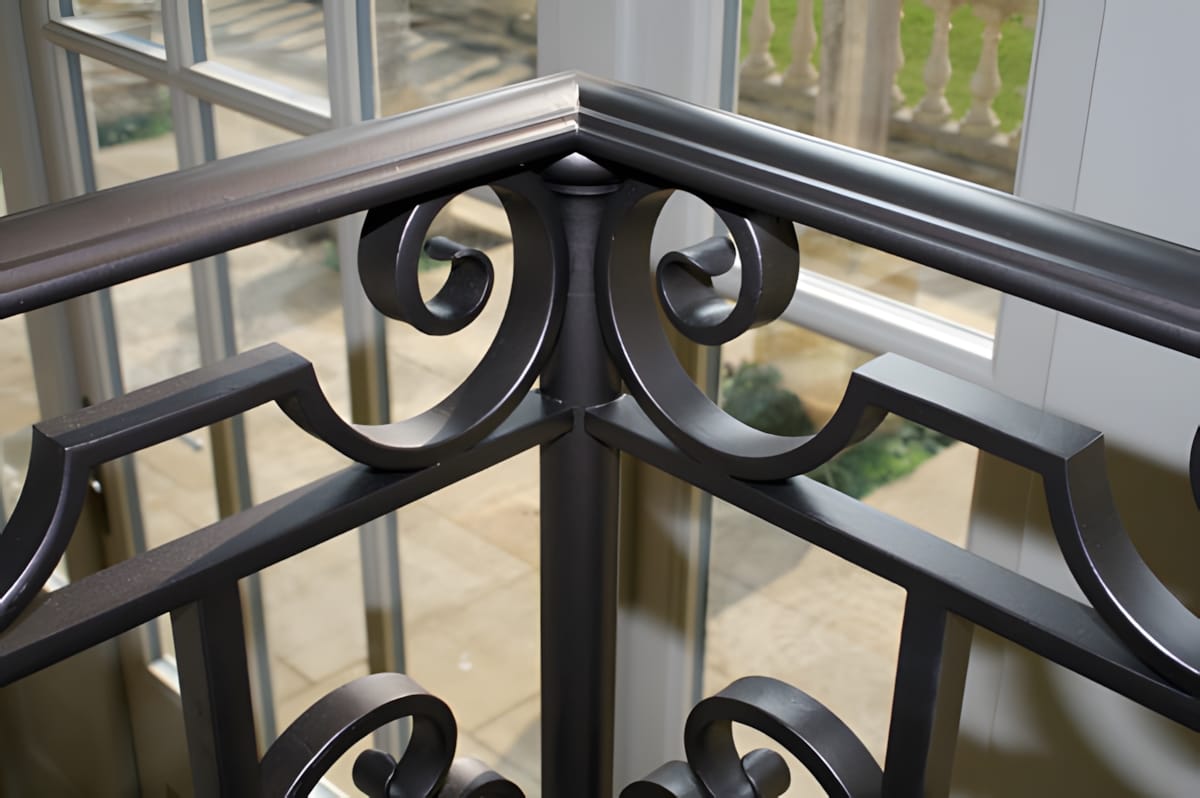 iron_handrail_upscayl_2x_upscayl-standard-4x Hand Forged Iron Scrollwork - Marble Stair Treads