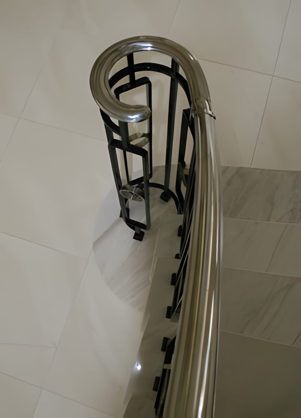 monkey_tail_handrail-2_upscayl_4x_upscayl-standard-4x Marble Staircase with Bespoke Balustrade & Stainless Steel HANDRAIL